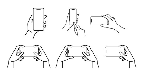 スマートフォンを持った手の素材