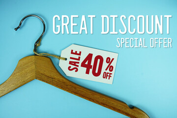 Great Discount Sale 40% off price tag label with Clothes hanger Clothing Promotion shopping concept