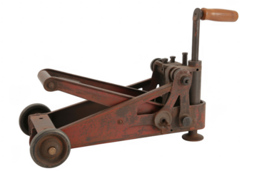 Old rusty metal manual press machine isolated on a transparent background