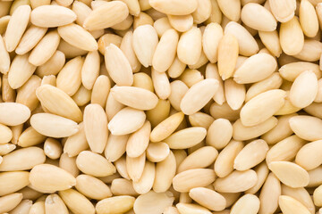 Almond nuts background. Closeup. Top down view.