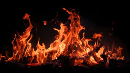 Fiery Flames Dancing in the Darkness - A Vivid and Intense Display of Fire.