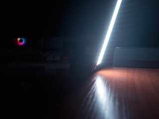 Office lamp on the table in dark room backdrop