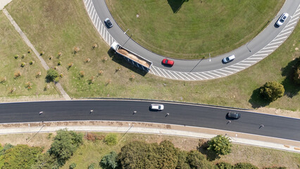 Aerial View of Roundabout with Cars and Truck