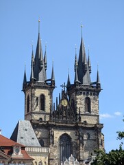 Fototapeta premium Stunning view of the Church of Our Lady before Týn in Prague, showcasing its Gothic architecture and intricate spires, a symbol of historical significance.