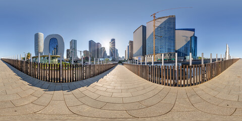 360 hdri seamless panorama on pedestrian path with bridge near skyscrapers with blue sky and good weather in equirectangular spherical projection, ready AR VR virtual reality content