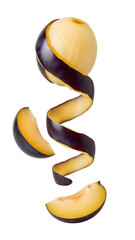 Peach fruit with spirally peeled skin and two slices isolated on white background, fresh healthy food concept