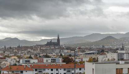 Clermont-Ferrand, France - 10 25 2025: Panoramic view of the cityscape, Cathedral Our Lady of the Assumption, Le Puy de D&ocirc;me and landscape