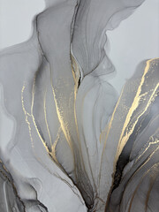 Abstract grey background with gold &mdash; black and white fluid art texture made with alcohol ink and golden potal. Beautiful gray natural art backdrop resembles marble, wing, aquarelle, water, splash.