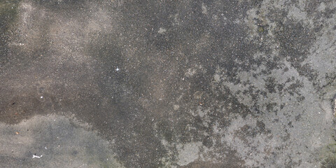 view from above on texture of asphalt road surface with cracks