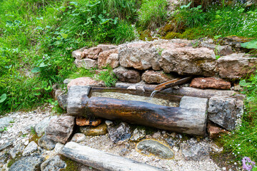 Man-made wellspring in mountain  close-up