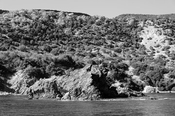 Rocks in the sea off the coast of Cyprus. Warm sea and picturesque coastal	
