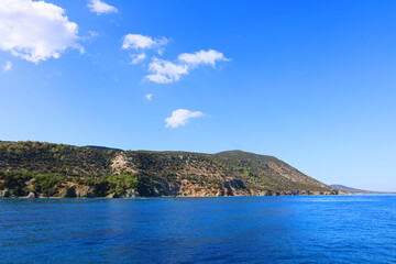 Fototapeta premium Rocks in the sea off the coast of Cyprus. Warm sea and picturesque coastal 