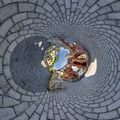 sphere inside overlooking multi-storey buildings of skyscrapers of residential complex, urban development. Transformation of spherical 360 panorama in abstract aerial view.