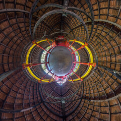 sphere inside overlooking multi-storey buildings of skyscrapers of residential complex, urban development. Transformation of spherical 360 panorama in abstract aerial view.