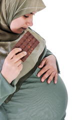 Pregnant muslim woman with chocolate