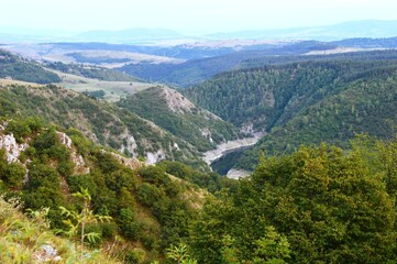 Naklejka premium river gorge through the hills