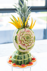 fruit carved shape beautiful flowers on white table