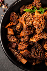 Morels mushrooms natural mushroom healthy food ingredient appetizer fresh tasty gourmet food background on the table rustic food top view copy space keto and paleo diet vegetarian and vegan food