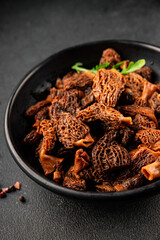 Morels mushrooms natural mushroom healthy food ingredient appetizer fresh tasty gourmet food background on the table rustic food top view copy space keto and paleo diet vegetarian and vegan food