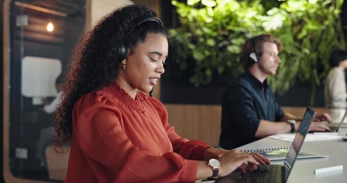Laptop, typing and woman in call center for customer service, language translation and coworking. Happy agent, hotline and contact us with computer for multilingual support, talking and help desk