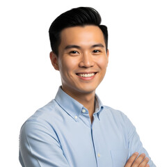 Confident young Asian man smiling with arms crossed in blue shirt
