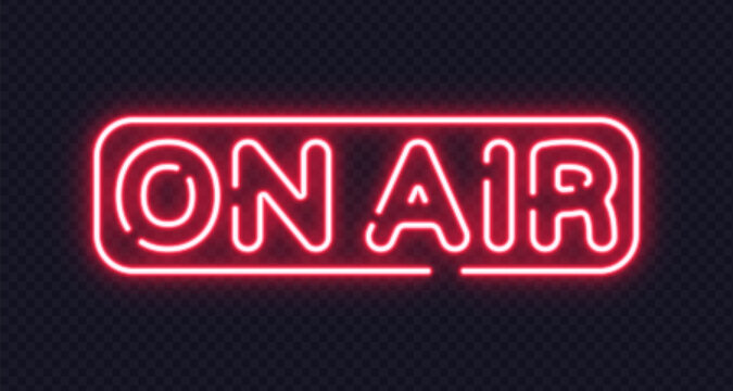 Red neon on air text inside capsule-shaped frame. Classic sign for live broadcasting, podcasts or studios.