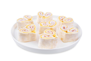 Ham Cheddar cheese cream cheese pinwheel in the form of hearts in a plate on a white isolated background