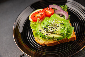 Avocado toast vegetable dish natural product tasty snack fresh delicious gourmet food background on the table rustic top view copy space keto and paleo diet vegan and vegan food