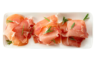 Delicious prosciutto slices with rosemary.
