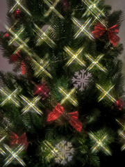 Decorated Christmas tree in bokeh with glowing lights