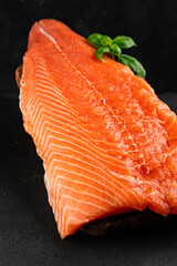 Salmon fillet raw red fish seafood dish natural tasty snack fresh delicious gourmet food background on the table rustic top view copy space pescetarian diet