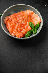 Salmon fillet raw red fish seafood dish natural tasty snack fresh delicious gourmet food background on the table rustic top view copy space pescetarian diet