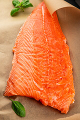 Salmon fillet raw red fish seafood dish natural tasty snack fresh delicious gourmet food background on the table rustic top view copy space pescetarian diet