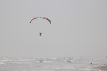 paraglider over the beach