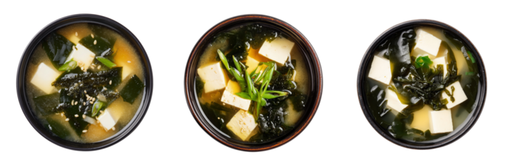 Top view of delicious bowls of miso soup with tofu and seaweed garnish isolated on transparent background