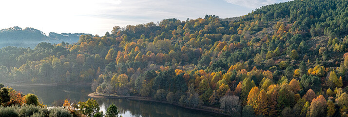 Autumn landscape of the Sierra de Gredos with a lagoon © EMILIA