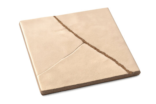 Wrapped square package on transparent background, tied with string.