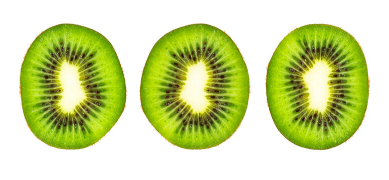 Three fresh kiwi fruit slices showing seeds pattern isolated on transparent background