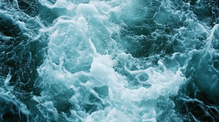Obraz premium Swirling blue water ocean foam turbulent sea aerial water texture wave churn aqua current sea