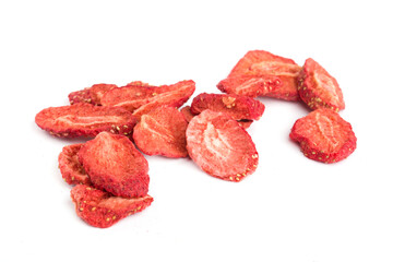 dried slices of strawberries on a white background