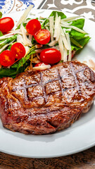 Grilled sirloin steak with salad
