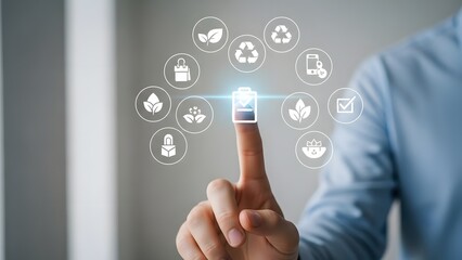Hand touching glowing battery icon surrounded by eco-friendly symbols, symbolizing sustainable energy and green technology concepts, emphasizing environmental responsibility