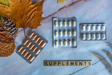 Nutrition supplements and vitamins for immune support in changing season.