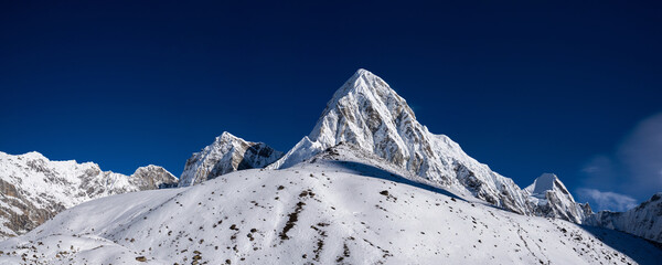 Panoramic view of the Kala Patthar and Pumo Ri peaks. Gorak Shep, the highes point of the Everest base camp trekking, Khumbu, Nepal.
