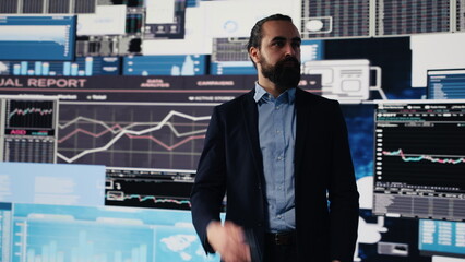 Entrepreneur on a business call analyzing financial charts and KPI models, reviewing investment trends. With a focus on planning, development and innovation, future success and growth. Camera A.