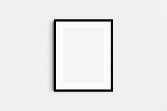 Frame mockup 4:5. Single black frame mockup. Clean, modern, minimalist, bright. Portrait. Vertical. Passepartout/mat opening in 3:4 aspect ratio.