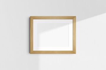 Horizontal frame mockup 5:4, 4:5 landscape. Single oak wood frame mockup. Clean, modern, minimalist, bright. Passepartout/mat opening in 4:3 aspect ratio. Shadow overlay.