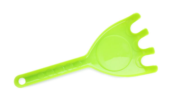 Plastic rake isolated on white, top view. Children's beach toy