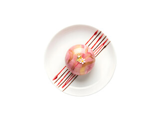 Delicate and Colorful Dessert on a White Plate with Artistic Sauce Presentation