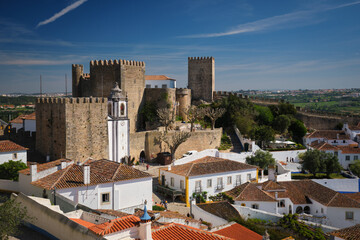 Exploring Obidos medieval castle and traditional houses in Portugal